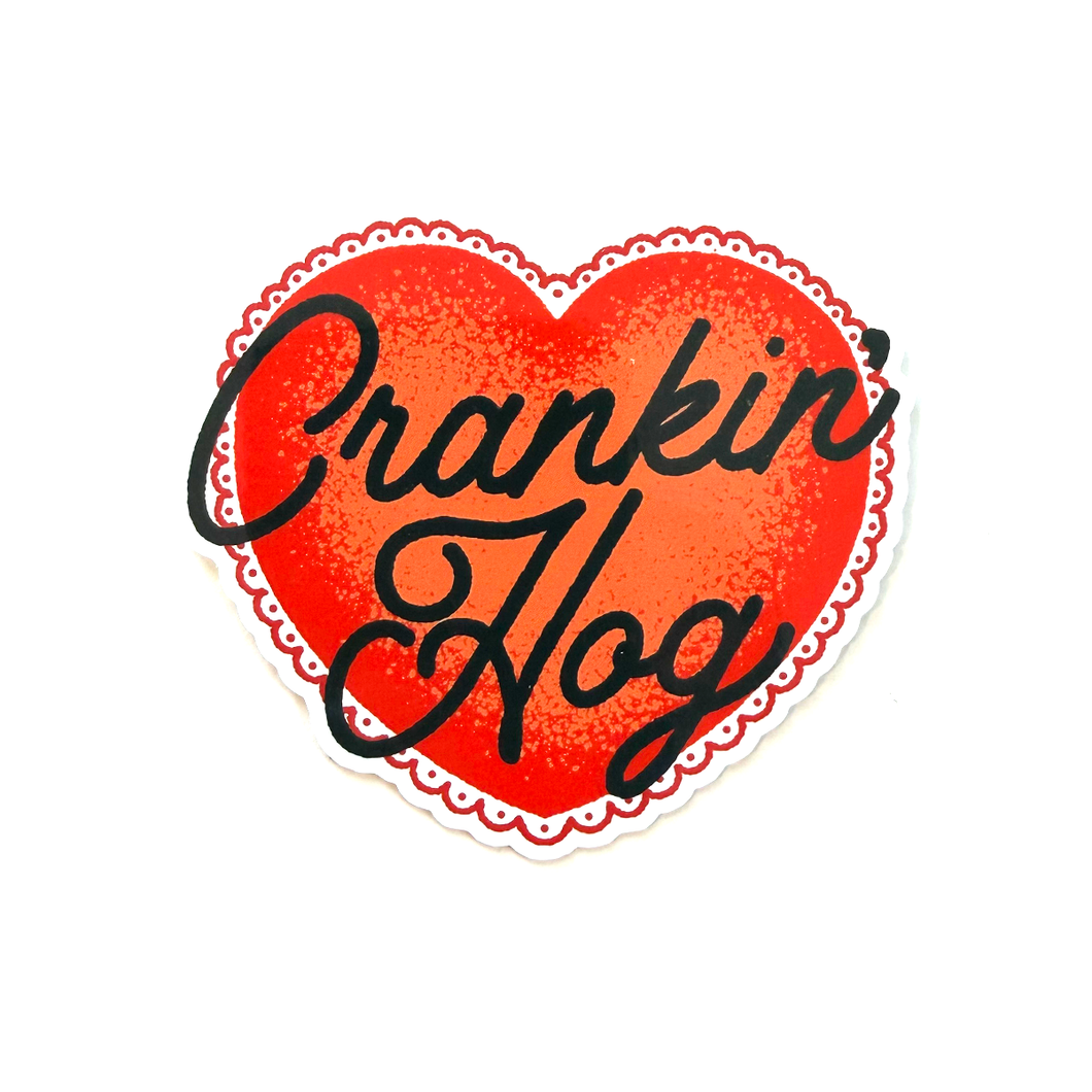Red heart sticker with black hand-drawn script typography reading “Crankin' Hog” in a clean, minimalist style.