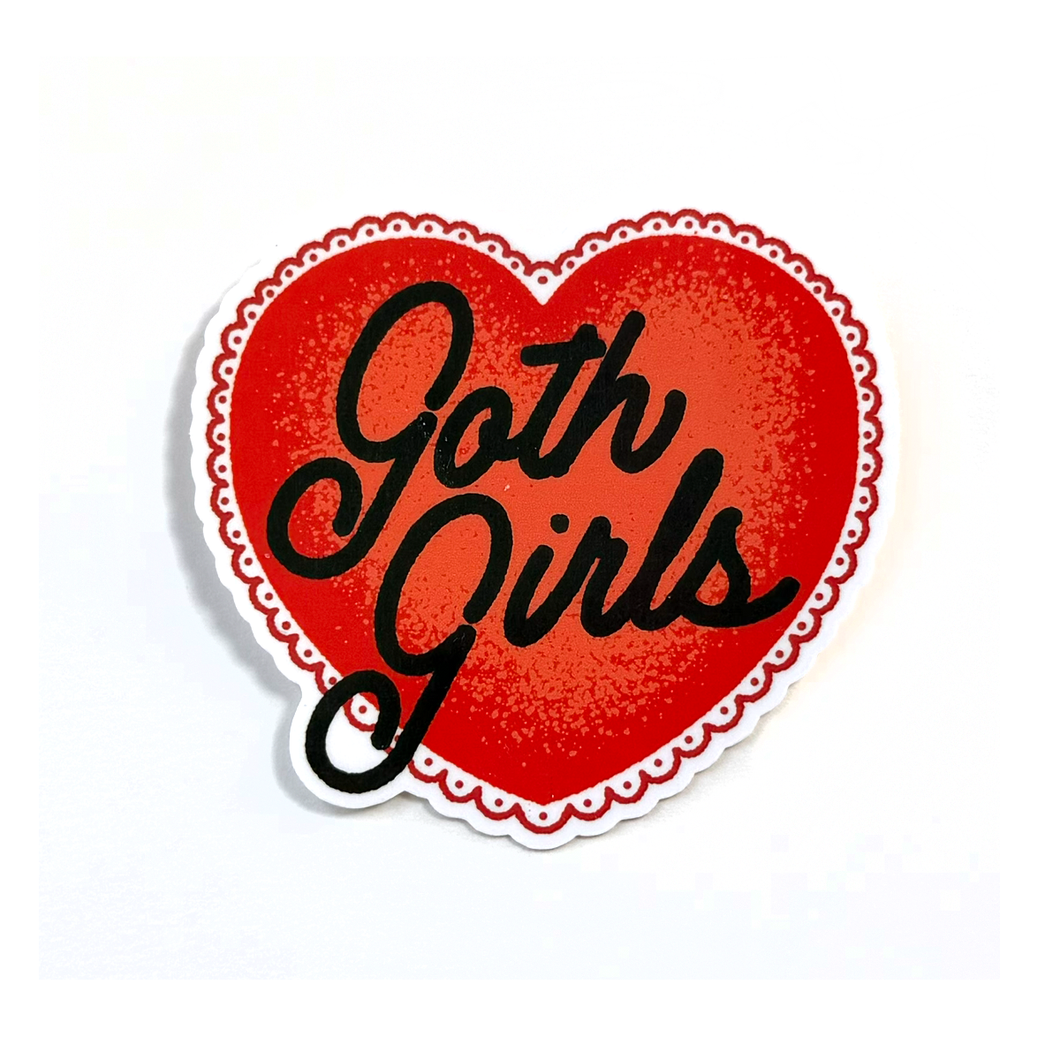 A die-cut sticker shaped like a red heart with a scalloped white border and the words 'Goth Girls' written in black script, shown on a plain white background.