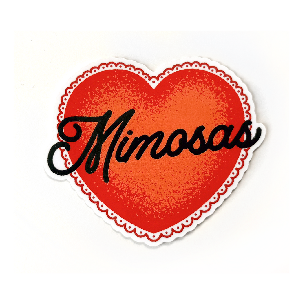 A heart-shaped sticker with a red textured center, a red scalloped border, and the word 'Mimosas' written across it in black cursive script, shown on a plain white background.