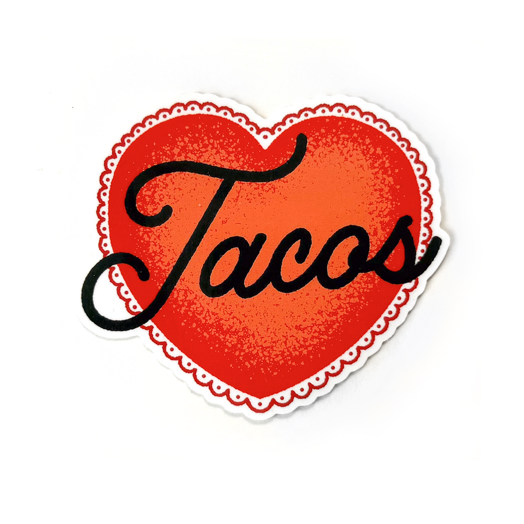 A heart-shaped sticker with a red textured center, a scalloped red border, and the word 'Tacos' in black cursive script, shown on a plain white background.