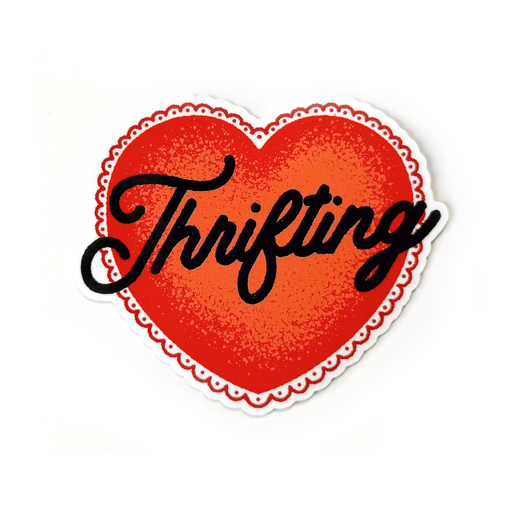 A heart-shaped sticker with a red textured center, a scalloped red and white border, and the word 'Thrifting' written across it in black cursive script, shown on a plain white background.